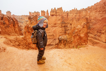 Boy hiking in Bryce canyon National Park, Utah, USAの写真素材
