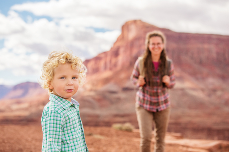 Mother and son travels to America on the Colorado river observation deck