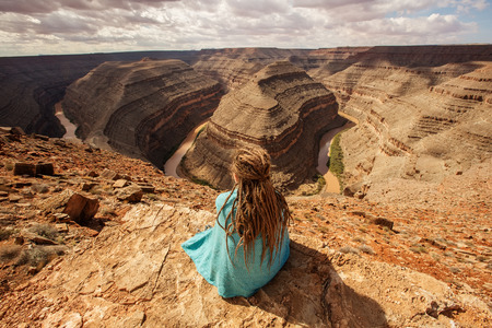 Woman relax in Goosenecks state Park,  USAの写真素材