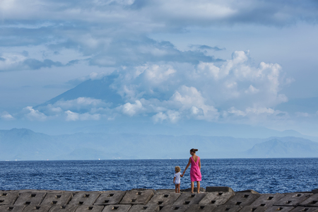 A family is having fun at the seashoreの写真素材