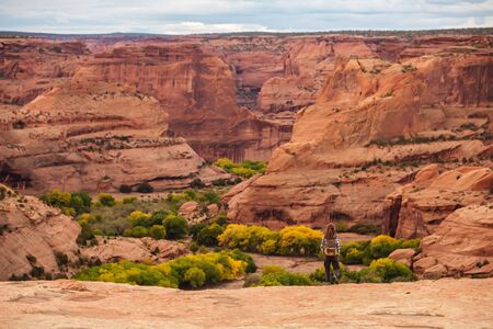 A hiker in the Canyon de Chelly National Monumentの写真素材