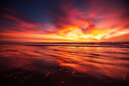 beautiful sunset in the oceanの写真素材