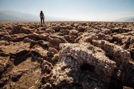 A hiker in Death Valley National Park, Geology, sand.の写真素材