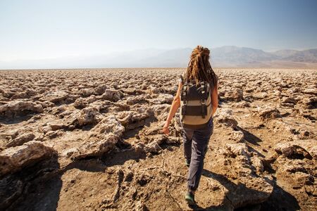 A hiker in Death Valley National Park, Geology, sand.の写真素材
