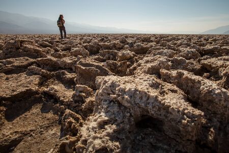 A hiker in Death Valley National Park, Geology, sand.の写真素材
