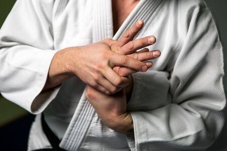 Two caucasian men are practicing aikido on the tatamiの写真素材