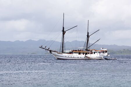 Sail boat near Aborek island, Raja Ampat, Indonesiaの写真素材