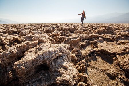A hiker in Death Valley National Park, Geology, sand.の写真素材