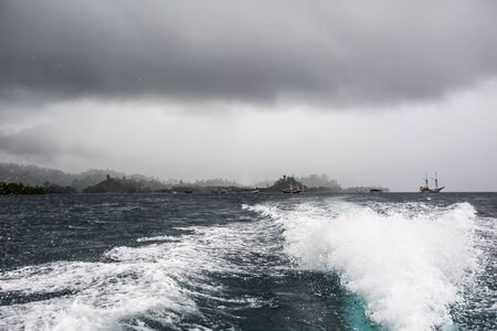 View to Waisai city from the sea in Raja Ampat, Indonesiaの写真素材