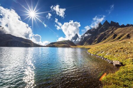Picturesque lake in valley of Caucasus mountains in Georgiaの写真素材