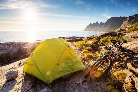 Tent near mountain lakeの写真素材