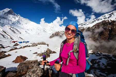 Hiker enjoys the view in the Himalayan mountainsの写真素材