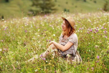 woman hiker enjoy the view at mountainの写真素材