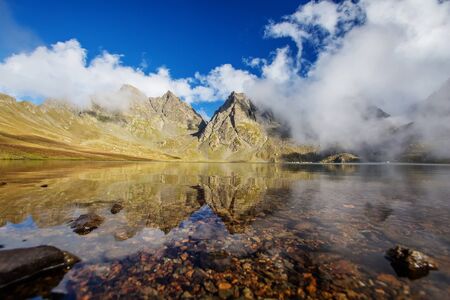 Picturesque lake in valley of Caucasus mountains in Georgiaの写真素材