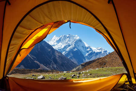 Beautiful landscape of Himalaya mountains through the tentの写真素材