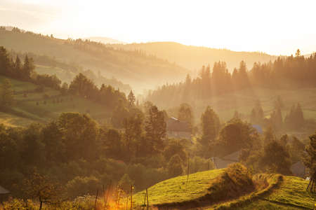 Beautiful sunrise in the Carpathian mountains in autumnの写真素材