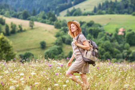 woman hiker enjoy the view at mountainの写真素材