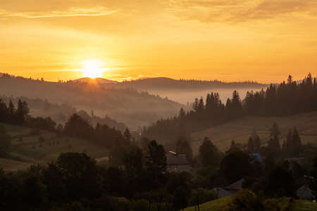 Beautiful sunrise in the Carpathian mountains in autumnの写真素材