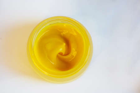 Cream in a jar on a white backgroundの写真素材