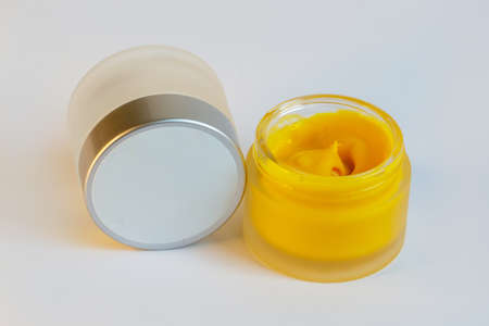Cream in a jar on a white backgroundの写真素材