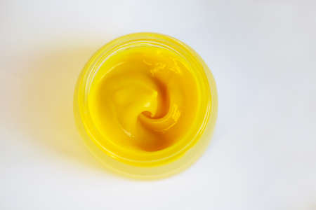 Cream in a jar on a whiteの写真素材