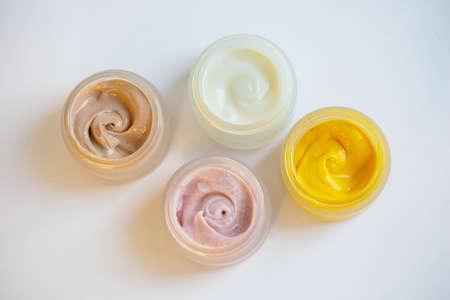 Cream in a jar on a white backgroundの写真素材
