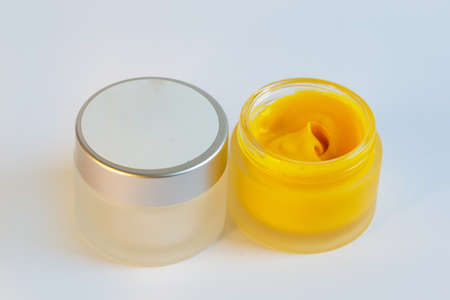 Cream in a jar on a white backgroundの写真素材