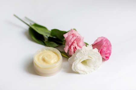 Cream in a jar on a white backgroundの写真素材