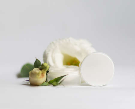 Cream in a jar on a white backgroundの写真素材