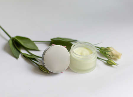 Cream in a jar on a white backgroundの写真素材