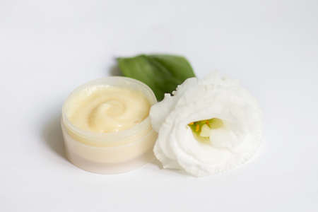Cream in a jar on a white backgroundの写真素材