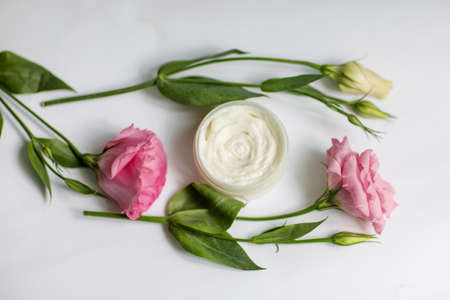 Cream in a jar on a white backgroundの写真素材