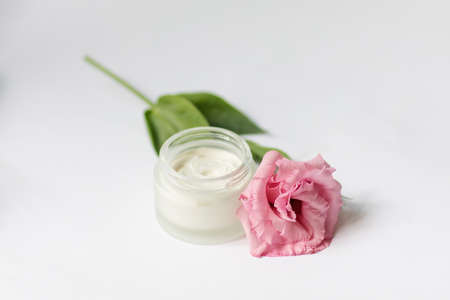Cream in a jar on a white backgroundの写真素材