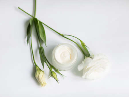 Cream in a jar on a white backgroundの写真素材