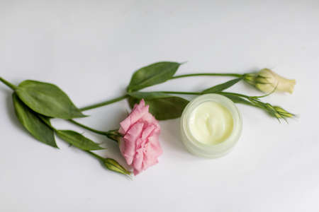 Cream in a jar on a white backgroundの写真素材