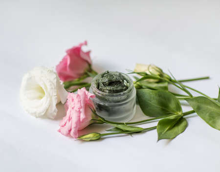 Cream in a jar on a white backgroundの写真素材