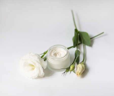 Cream in a jar on a white backgroundの写真素材
