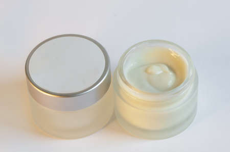 Cream in a jar on a white backgroundの写真素材