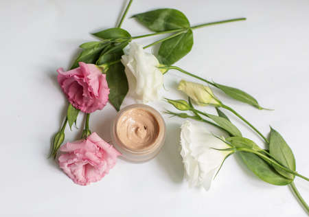 Cream in a jar on a white backgroundの写真素材