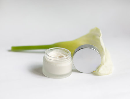 Cream in a jar on a white backgroundの写真素材