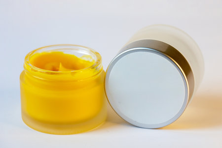 Cream in a jar on a white backgroundの写真素材