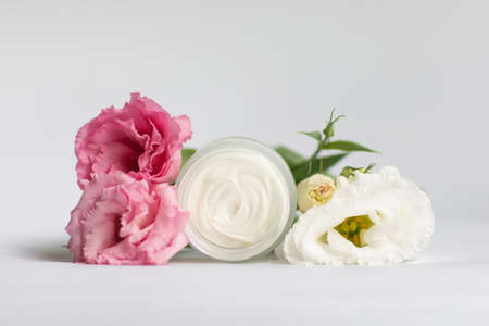 Cream in a jar on a white backgroundの写真素材