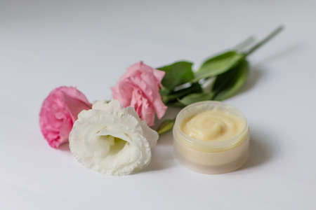 Cream in a jar on a white backgroundの写真素材