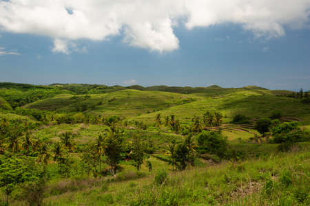 Beautiful green slopes on the island of Nusa Penidaの写真素材