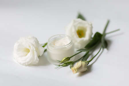 Cream in a jar on a white backgroundの写真素材