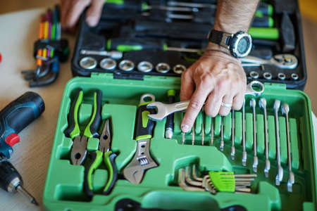 The wizard puts a set of tools in a boxの写真素材