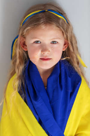 A little girl from Ukraine is crying for her homeの写真素材