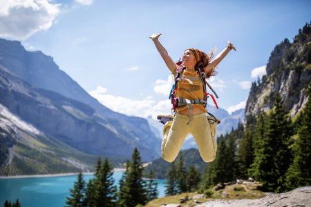Tourist in the mountains in Switzerland on Lake Oeschinenseeの写真素材