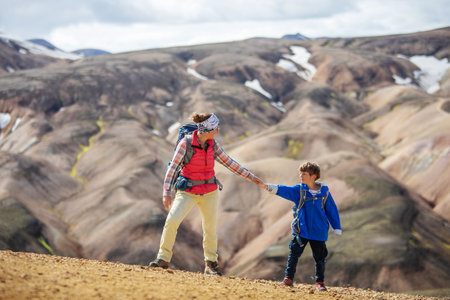 The family went hiking in Landmanloer Park in Icelandの写真素材