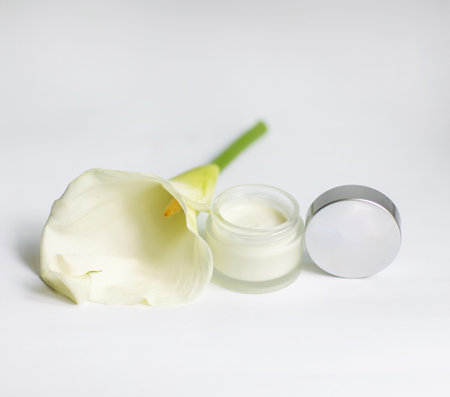 Cream in a jar on a white backgroundの写真素材